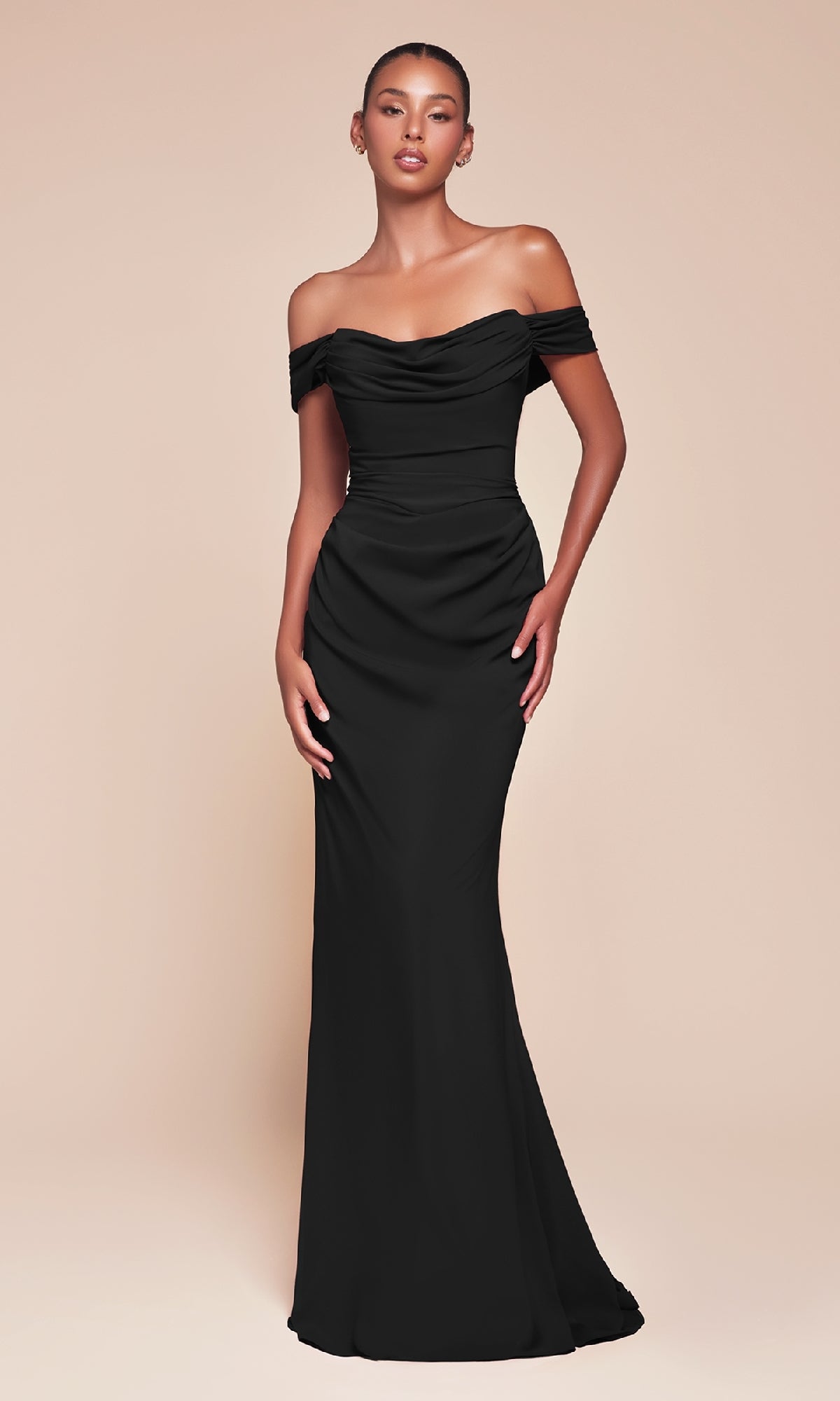 A woman wearing the Ladivine 7433 Multi-Way Long Chiffon Prom Dress stands against a plain beige background.